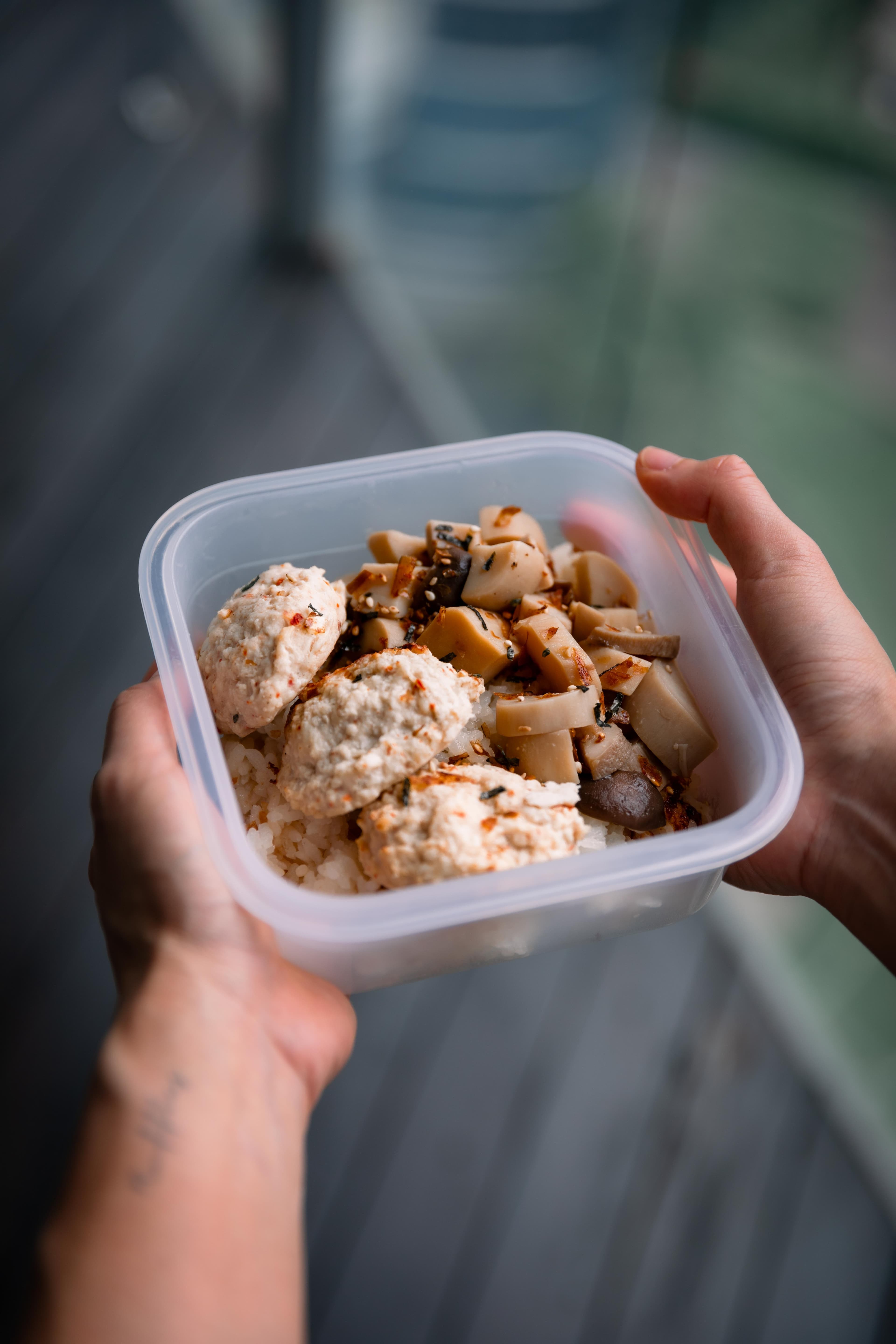 nombo chicken meatballs with rice and mushrooms in a meal-prep container